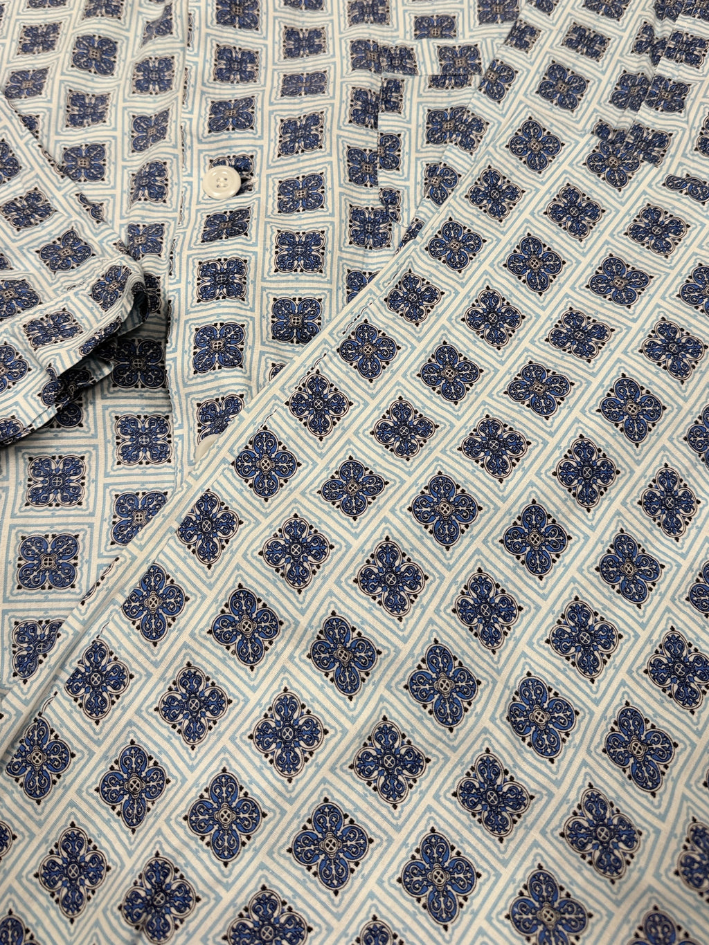OMJ Vintage cotton pajama set featuring a blue and white geometric tile print with a button-down notched collar shirt.