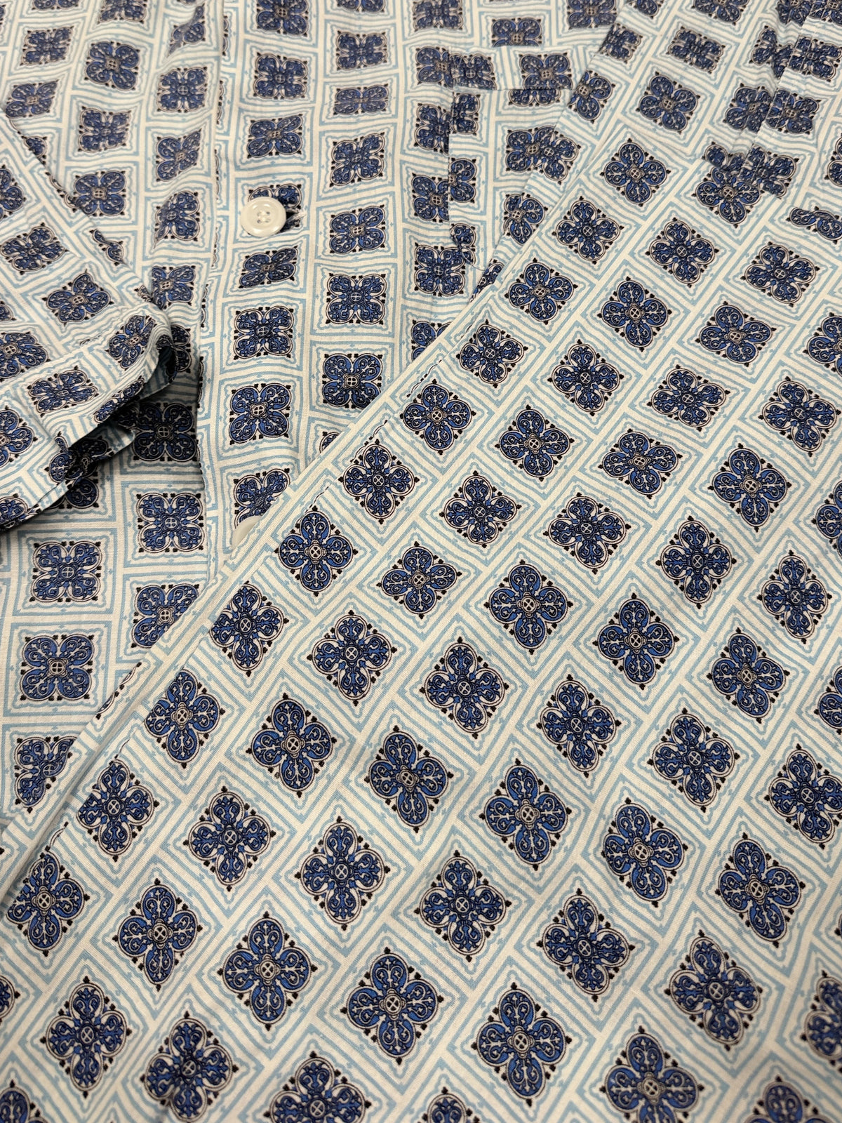 OMJ Vintage cotton pajama set featuring a blue and white geometric tile print with a button-down notched collar shirt.